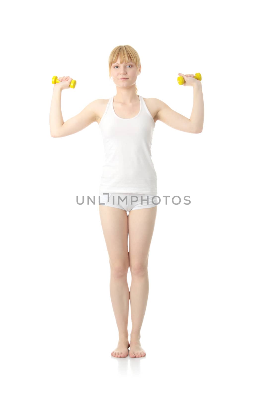 Beautiful young woman doing exercise , isolated