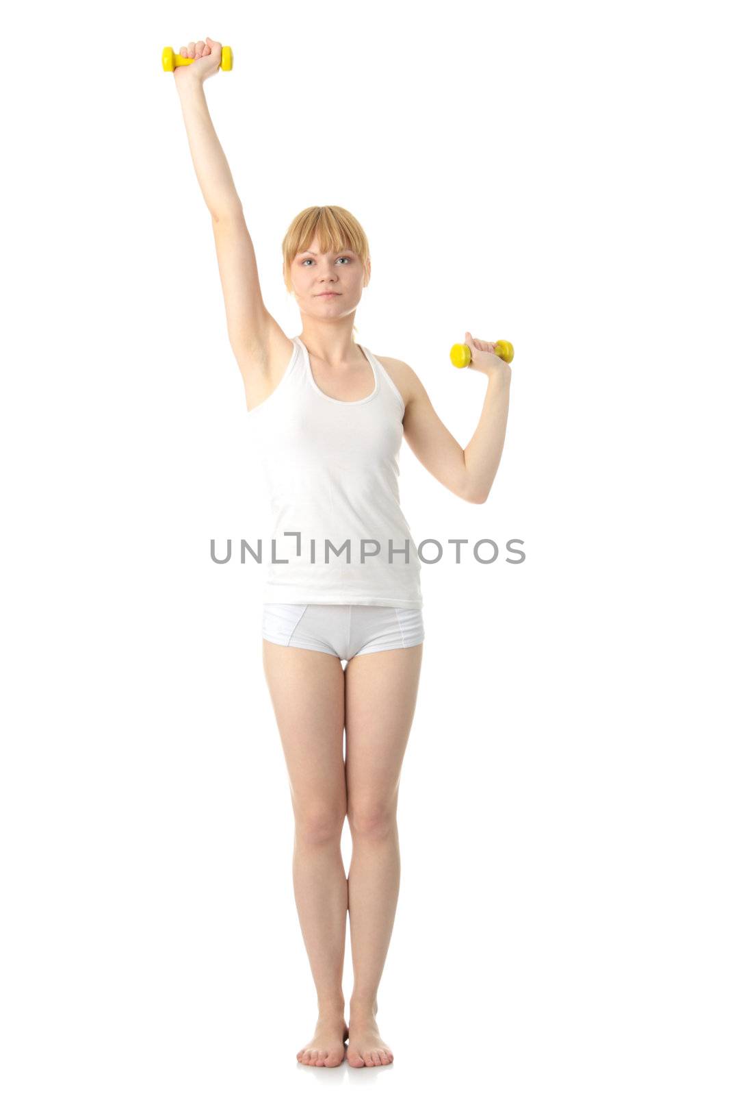 Beautiful young woman doing exercise by BDS