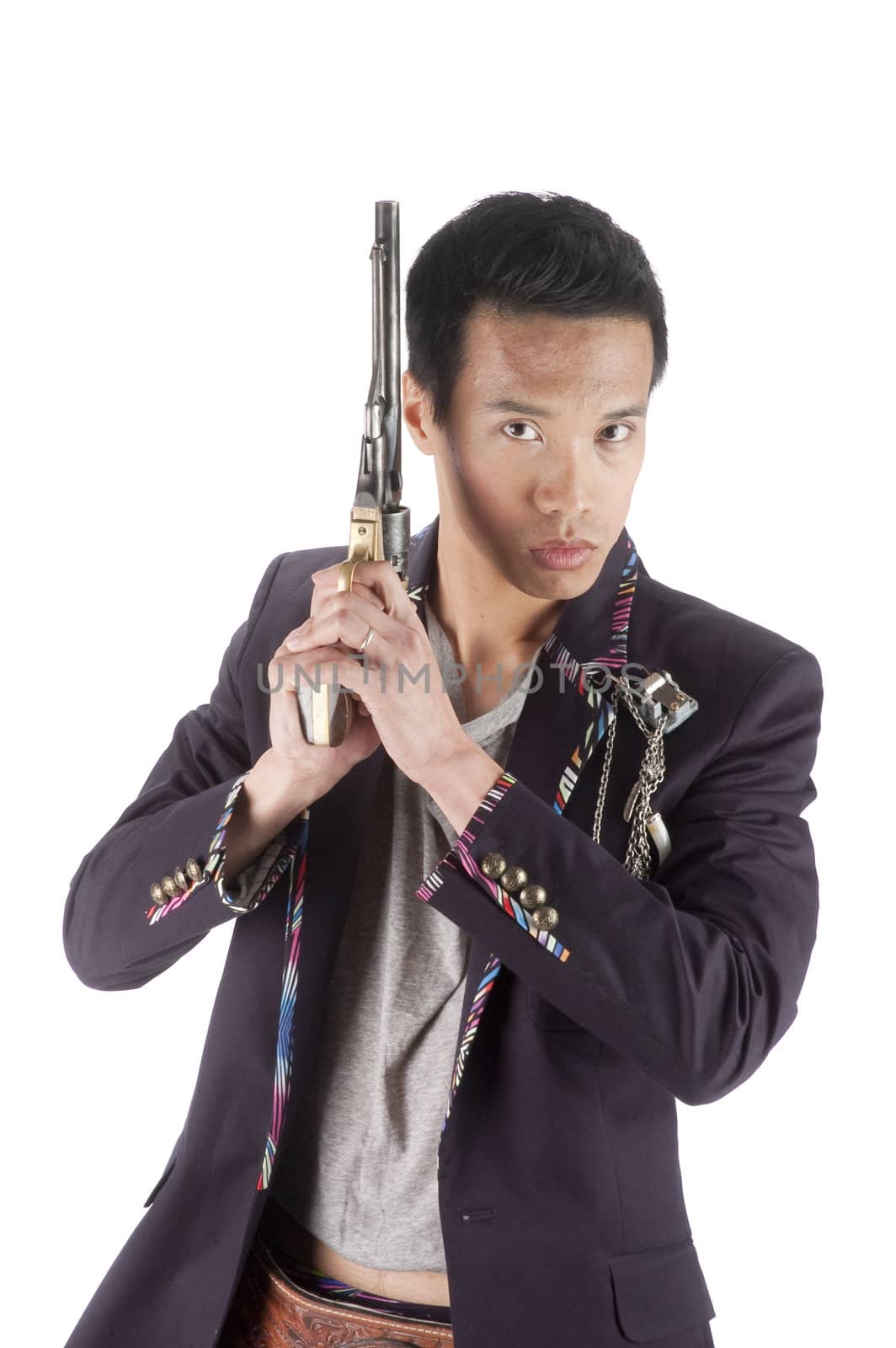 closeup of a young asisn man with a revolver in his hand