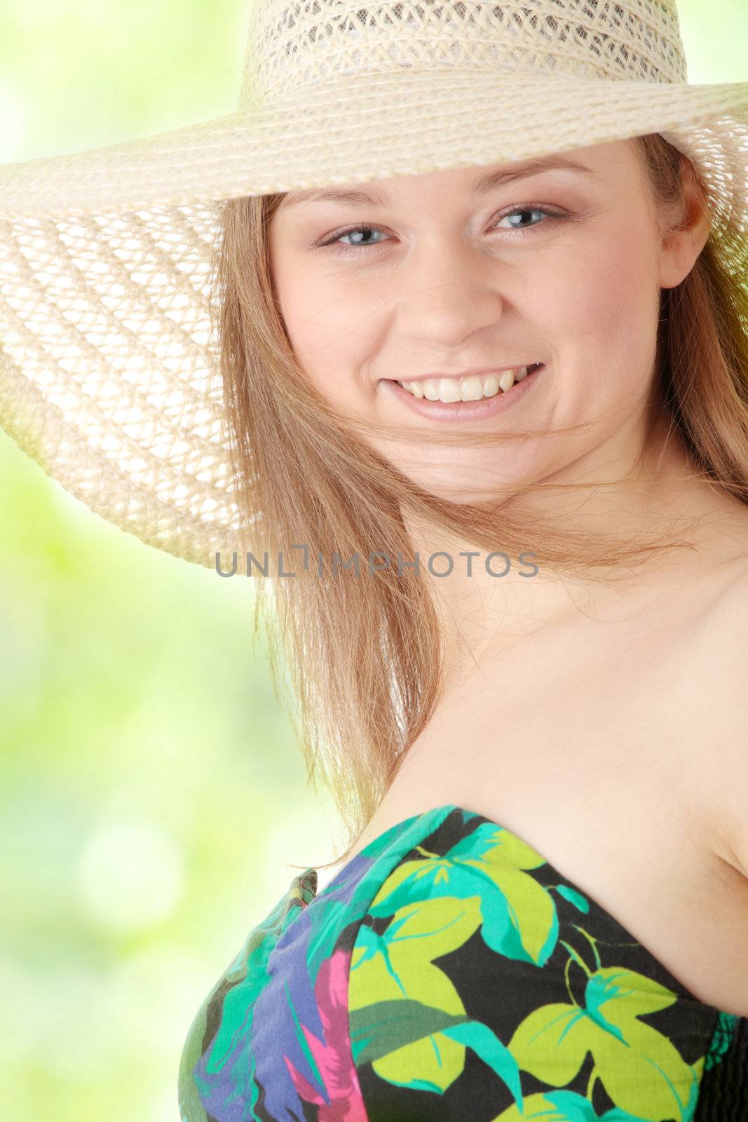 Beautiful Fashion Model Wearing A Retro Summer Hat