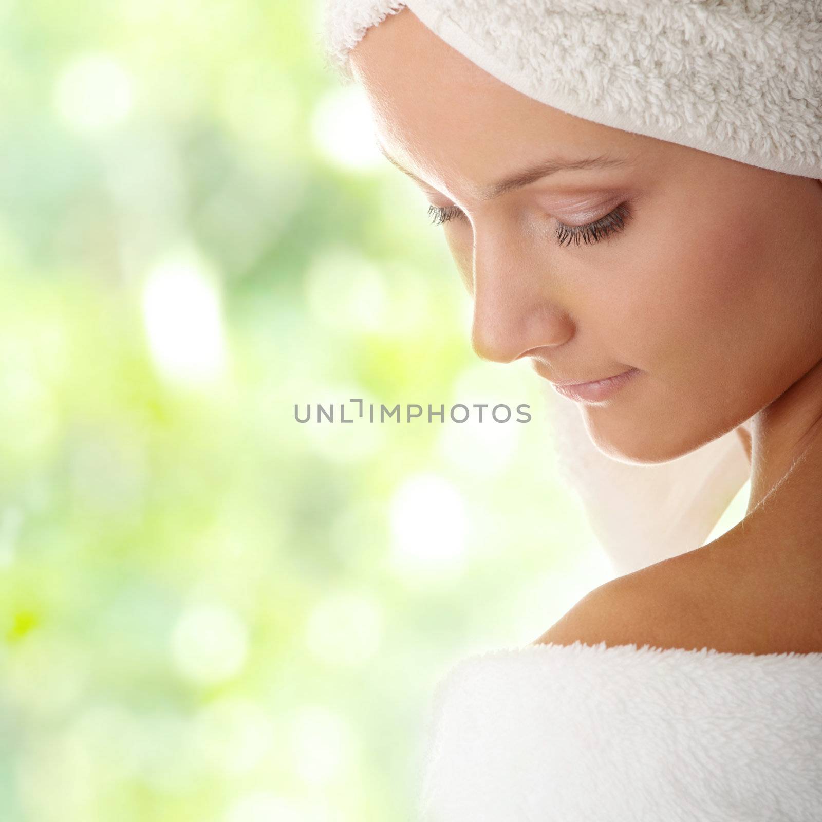 Relax concept:  beautiful woman with soft skin in bathrobe