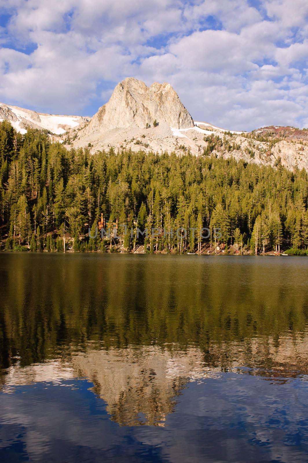 reflection in mountain lake at dawn on the Minarets at Mammoth Lake, California