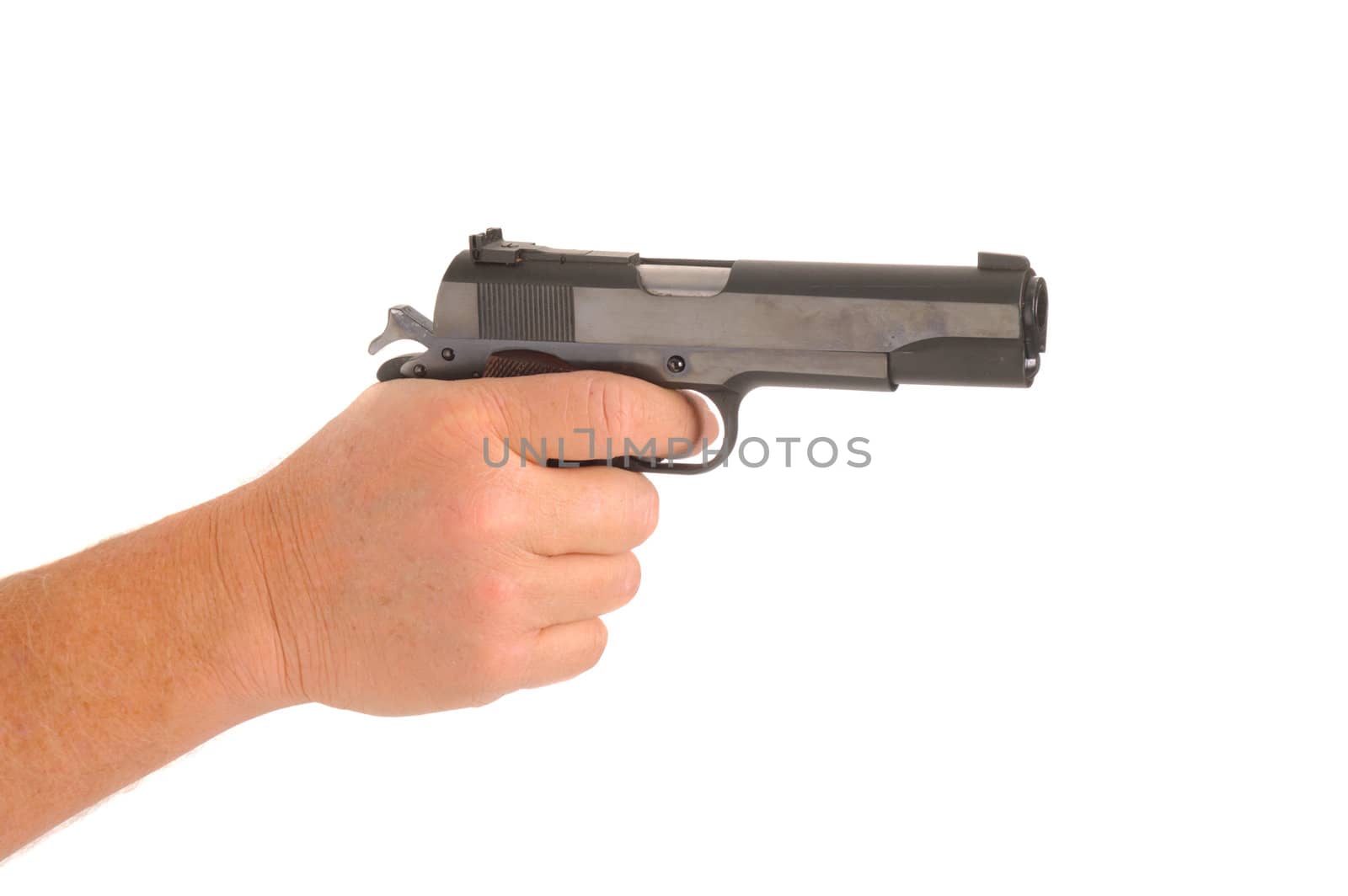 hand holding semi-automatic pistol cocked ready to fire, isolated on white