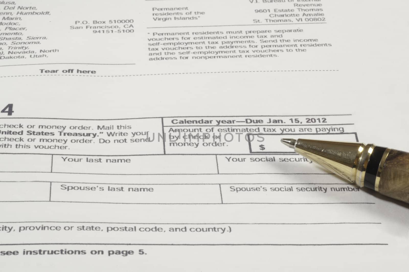 pen ready to use on a tax form