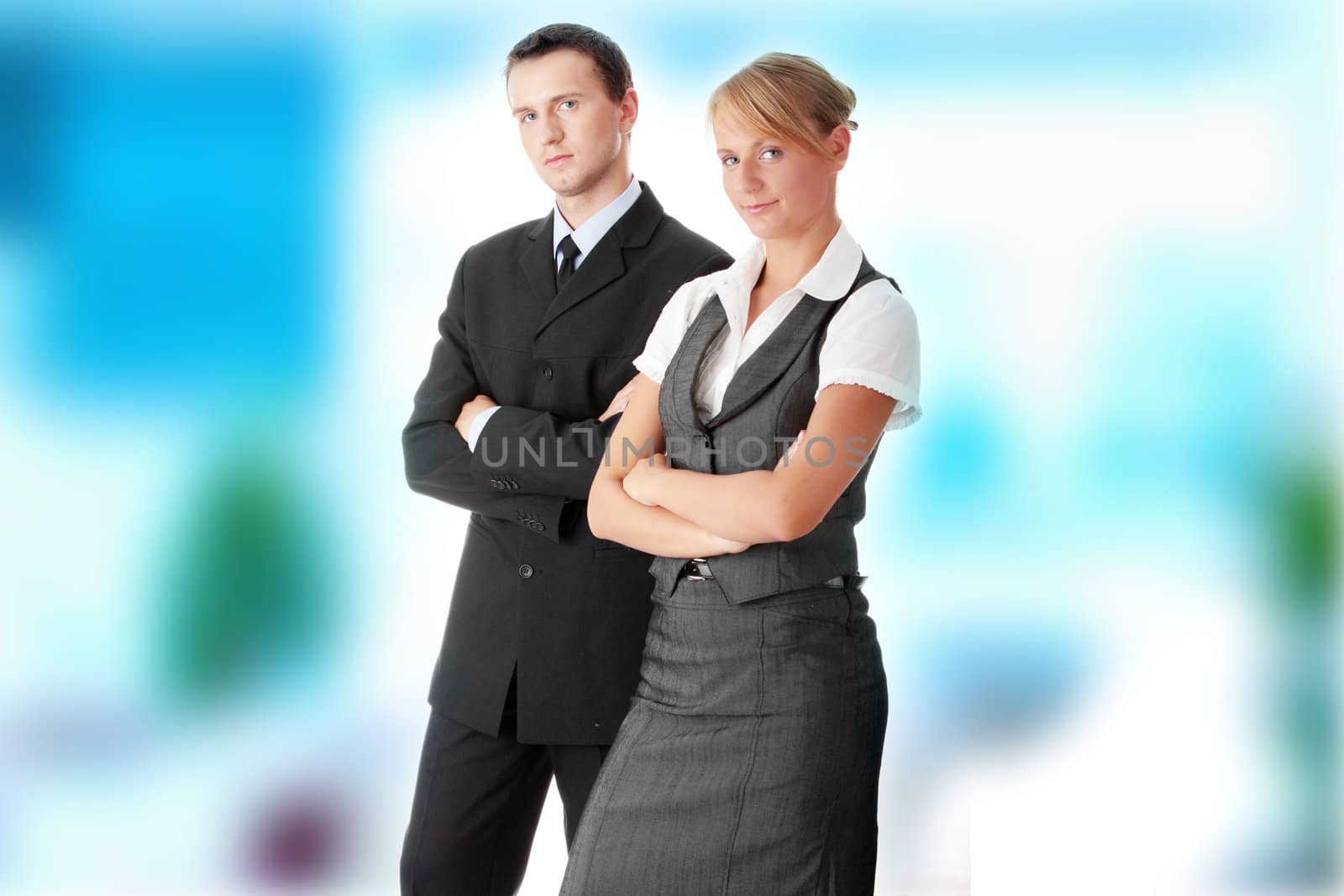 Young attractive business people standing