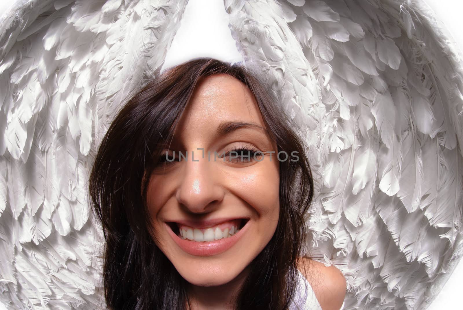 Young woman with angel wings isolated on white taken with fish eye lens