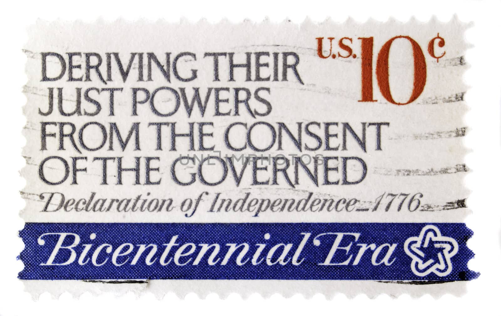 U.S. circa 1976: U.S. vintage postage stamp, commemorating the bicentennial witht he phrase :Deriving their just powers from the consent of the governed" and a face value of 10c