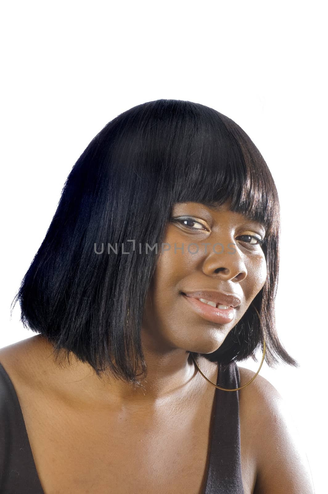 Young smiling African American woman in closeup with strong rimlight isolated on white