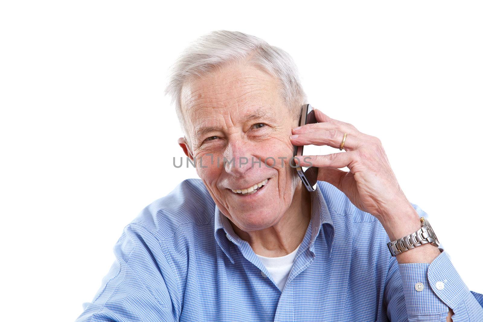 Senior man laughing on the phone