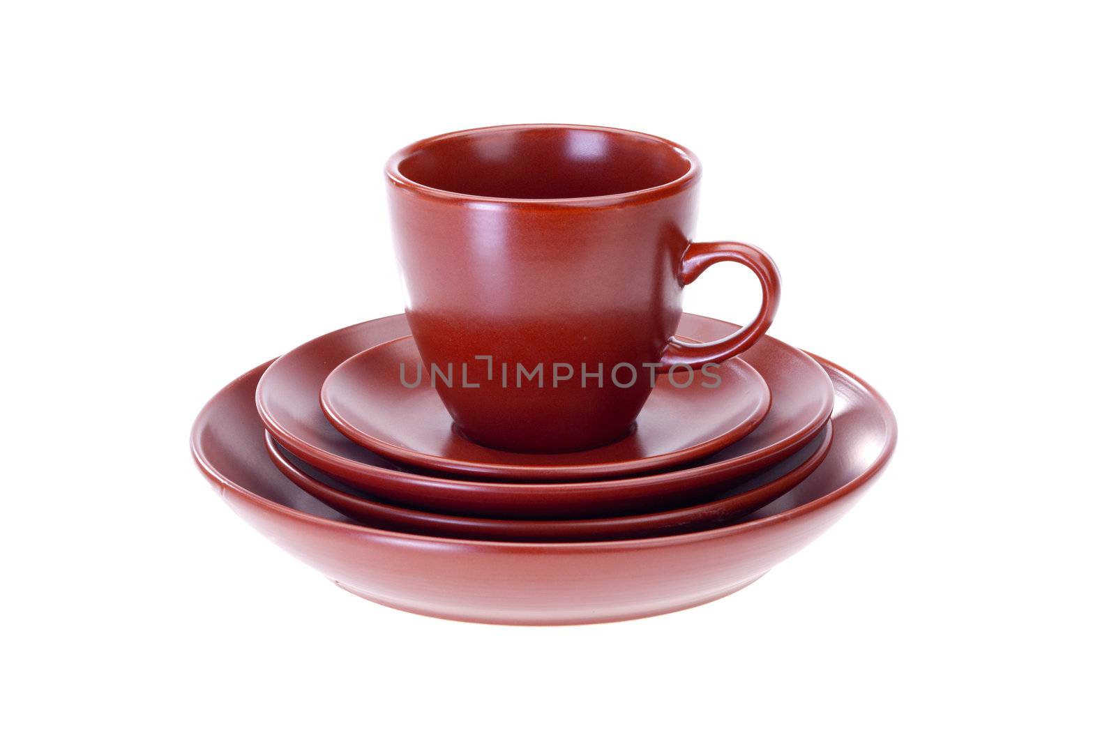 set of tableware over white background, cup and plates