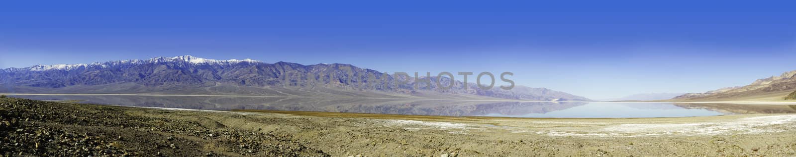 seasonal lake that forms during the winter rains in Death Valley which is surrounded by mountains