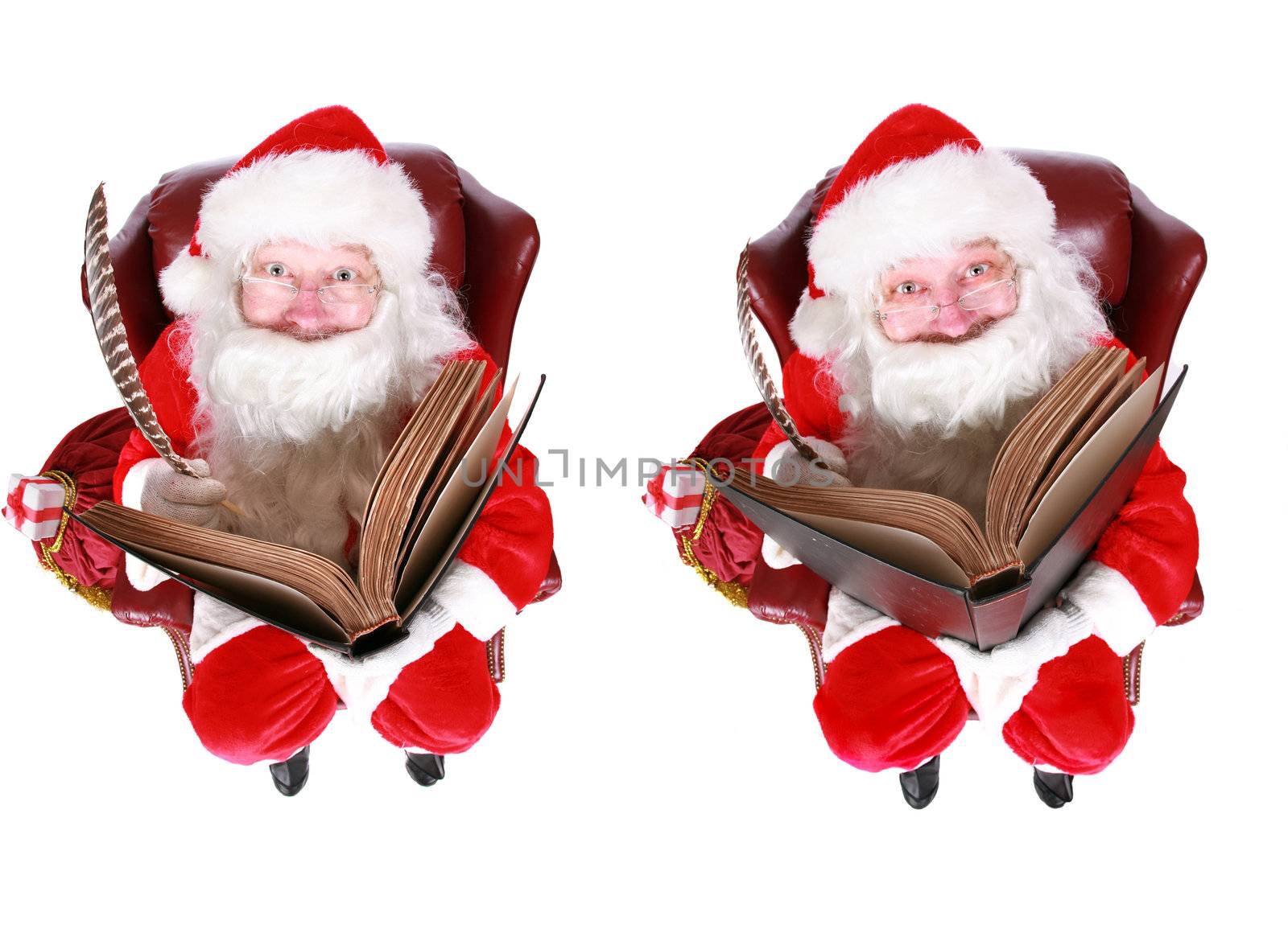 Closeup of Santa Claus (that jolly old elf that  lives at the North Pole) reading and writing in the book of good children, taken with a fish eye lens for added humor