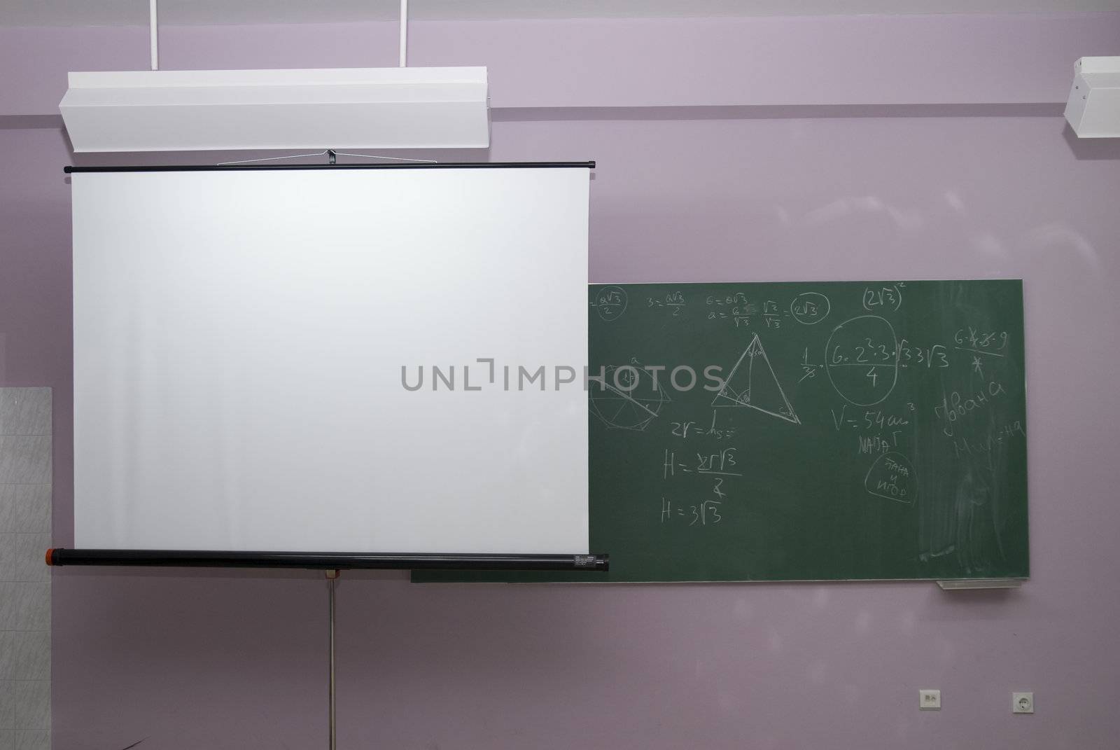 Classroom interior,with  panel and  projection screen.