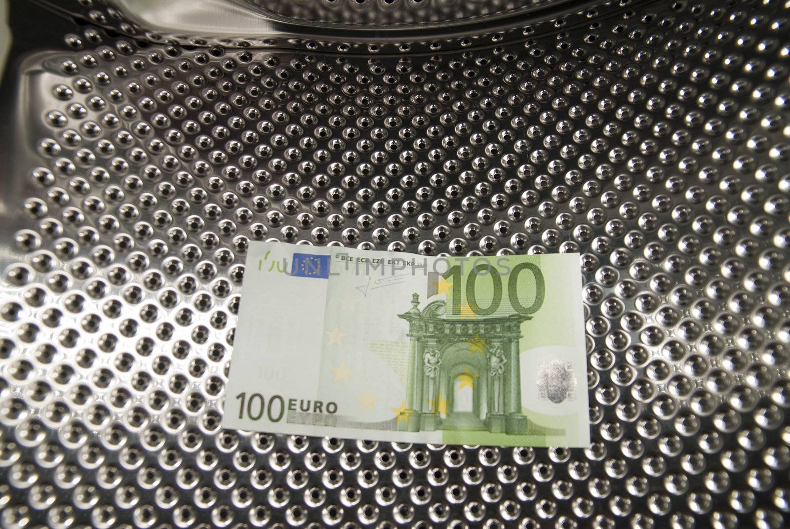 Euro bills in the lattice drumhead,of Washing Machine.