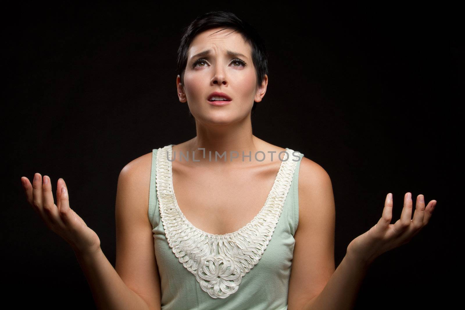 Young sad christian woman praying