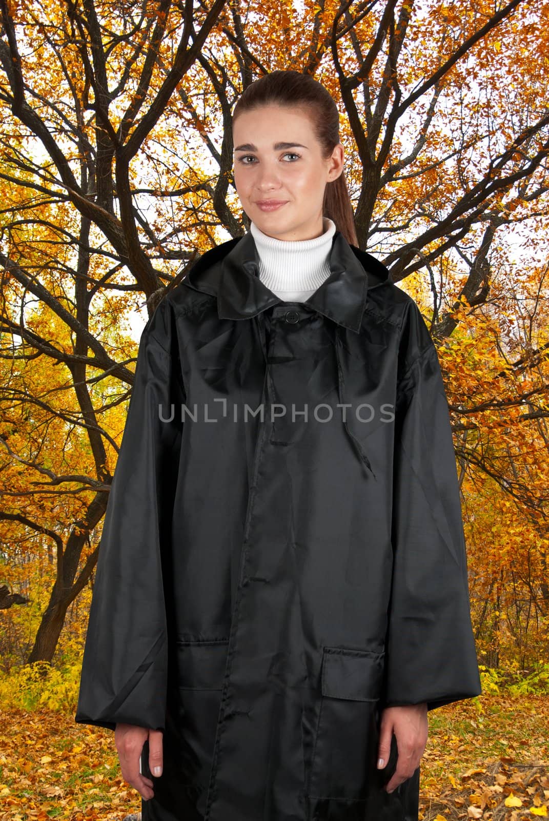 woman in rain coat by rusak