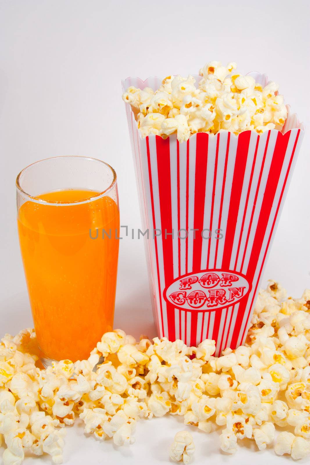 Picture of a popcorn holder with a soda