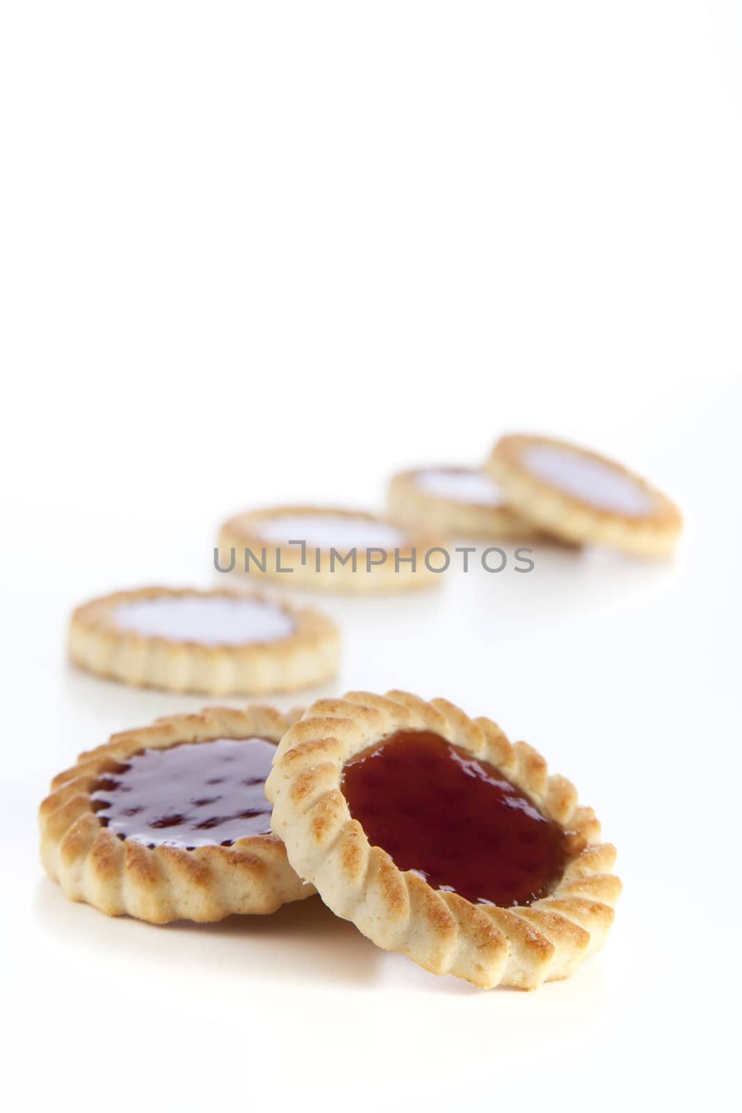 Jelly filled cookies isolated on a white background.