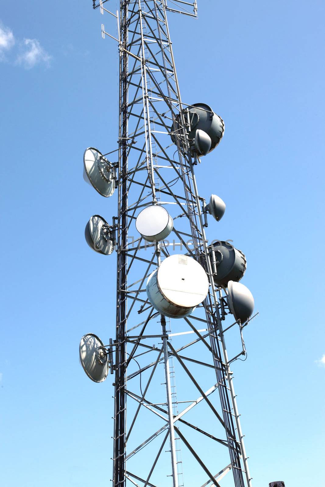 Various electronic devices attached to a tall tower for clear a signal.