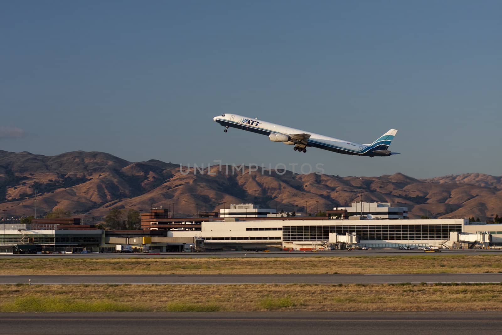 Large jet takes off from Mineta San Jose International Airport (SJC), San Jose, California, USA.  SJC is the commercial airport for the Silicon Valley.