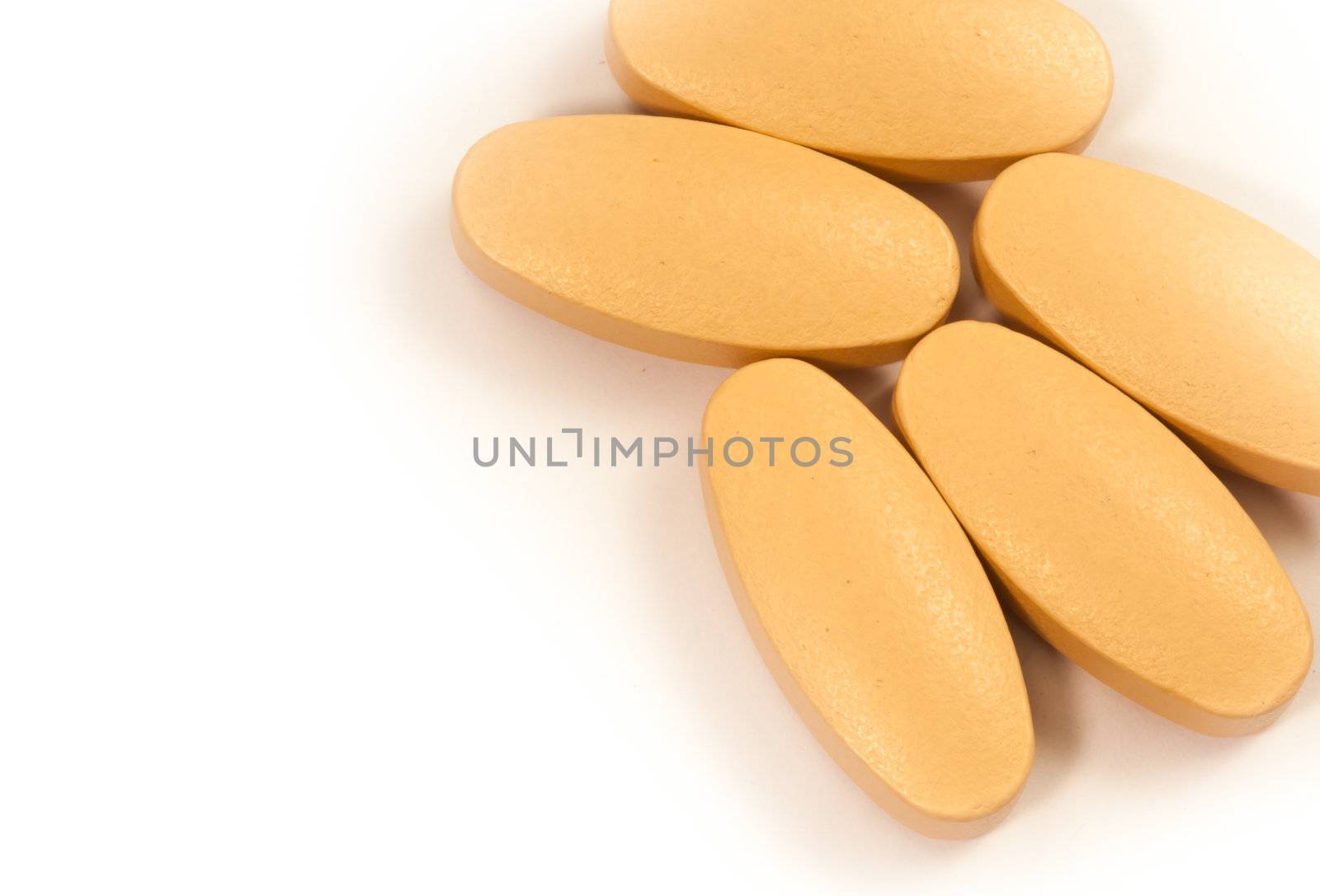 Supplements food in the form pills isolated on white.