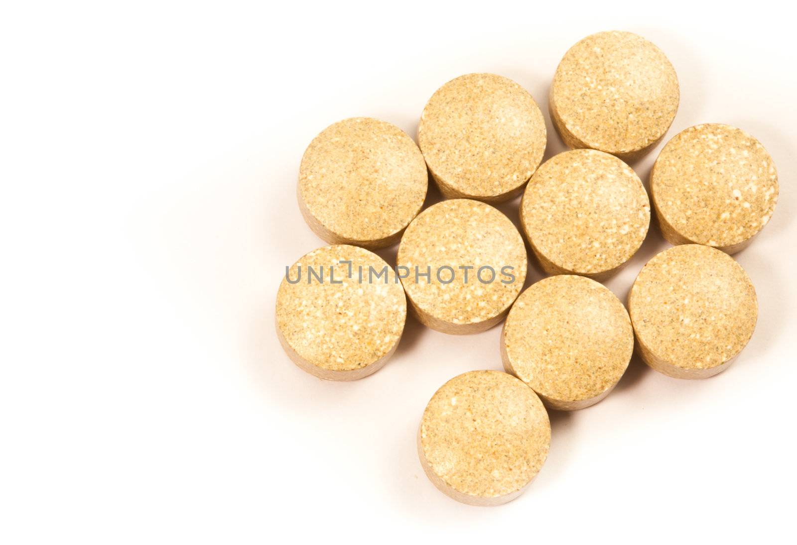 Supplements food in the form pills isolated on white.