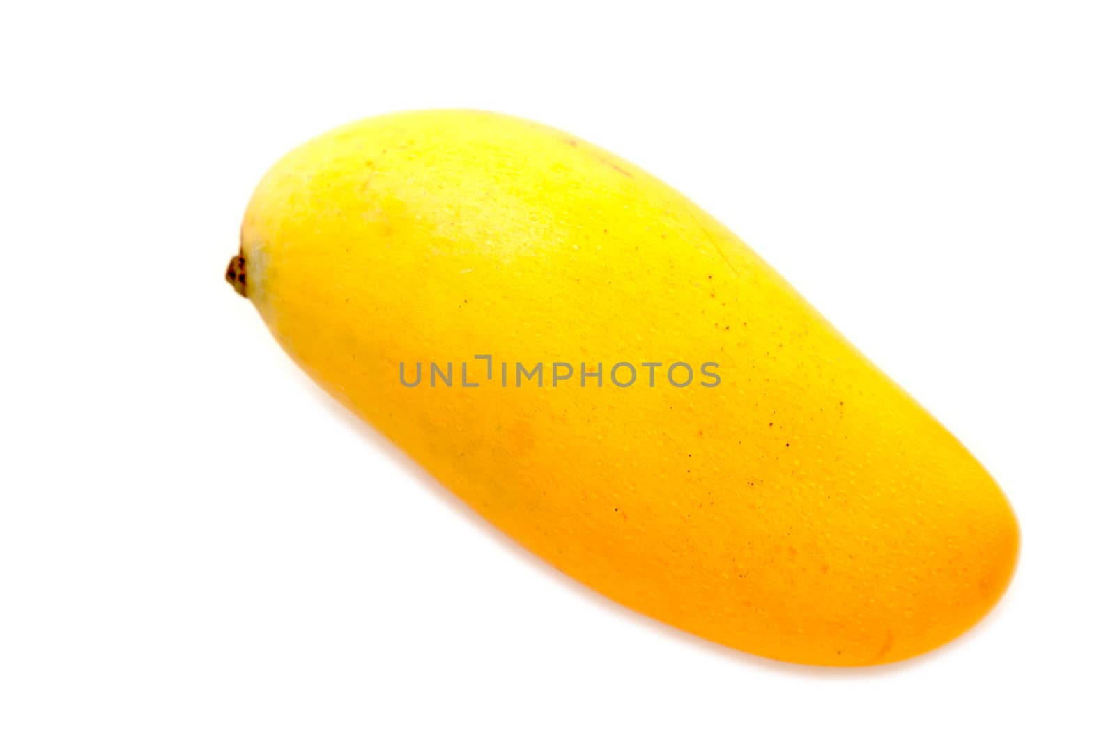 Ripe mango on white isolated background.