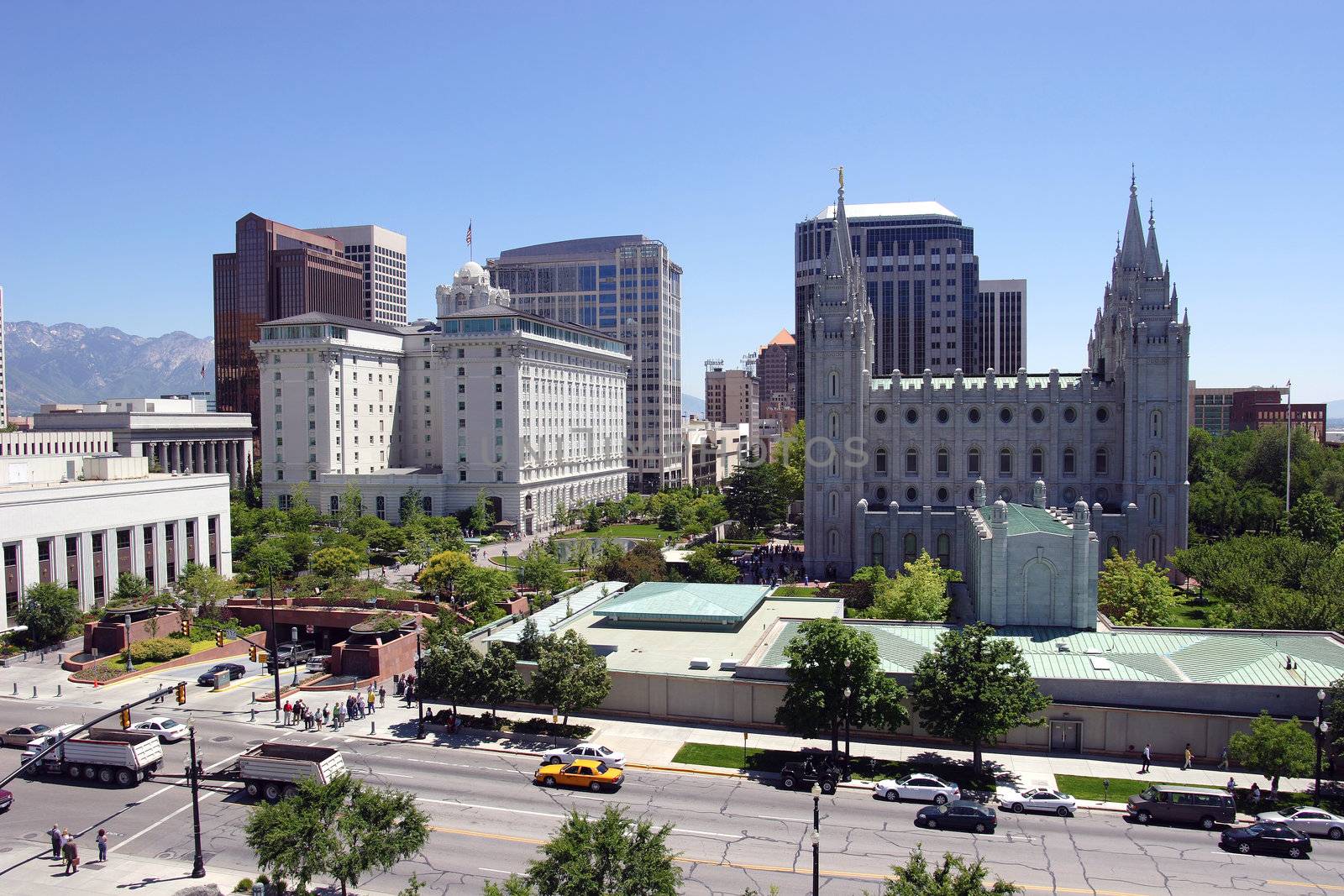 A scene of downtown Salt Lake city in Utah. The Mormon church tabernacle is seen in the foreground.