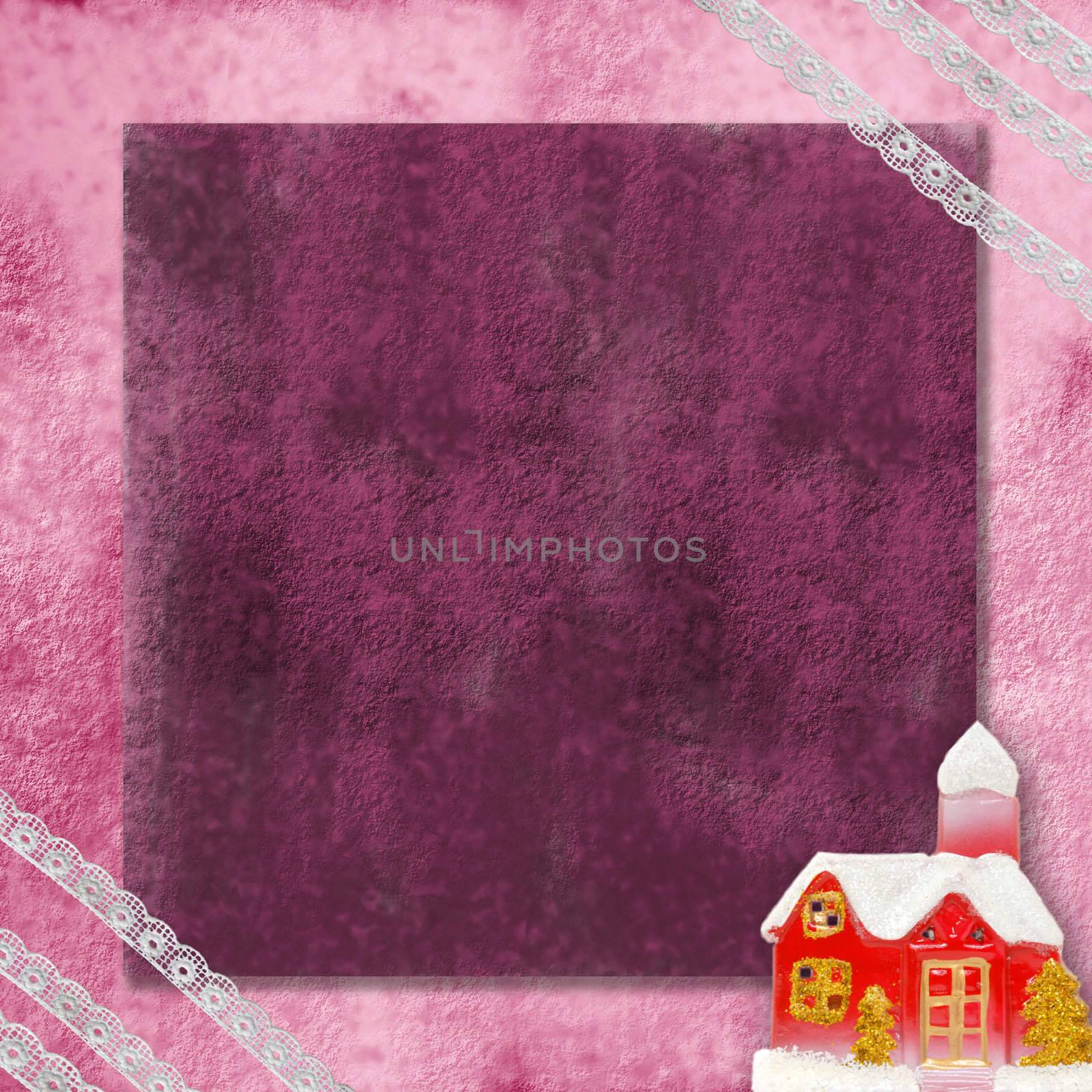 Christmas card with a red house in snow and old lace around the edges.
