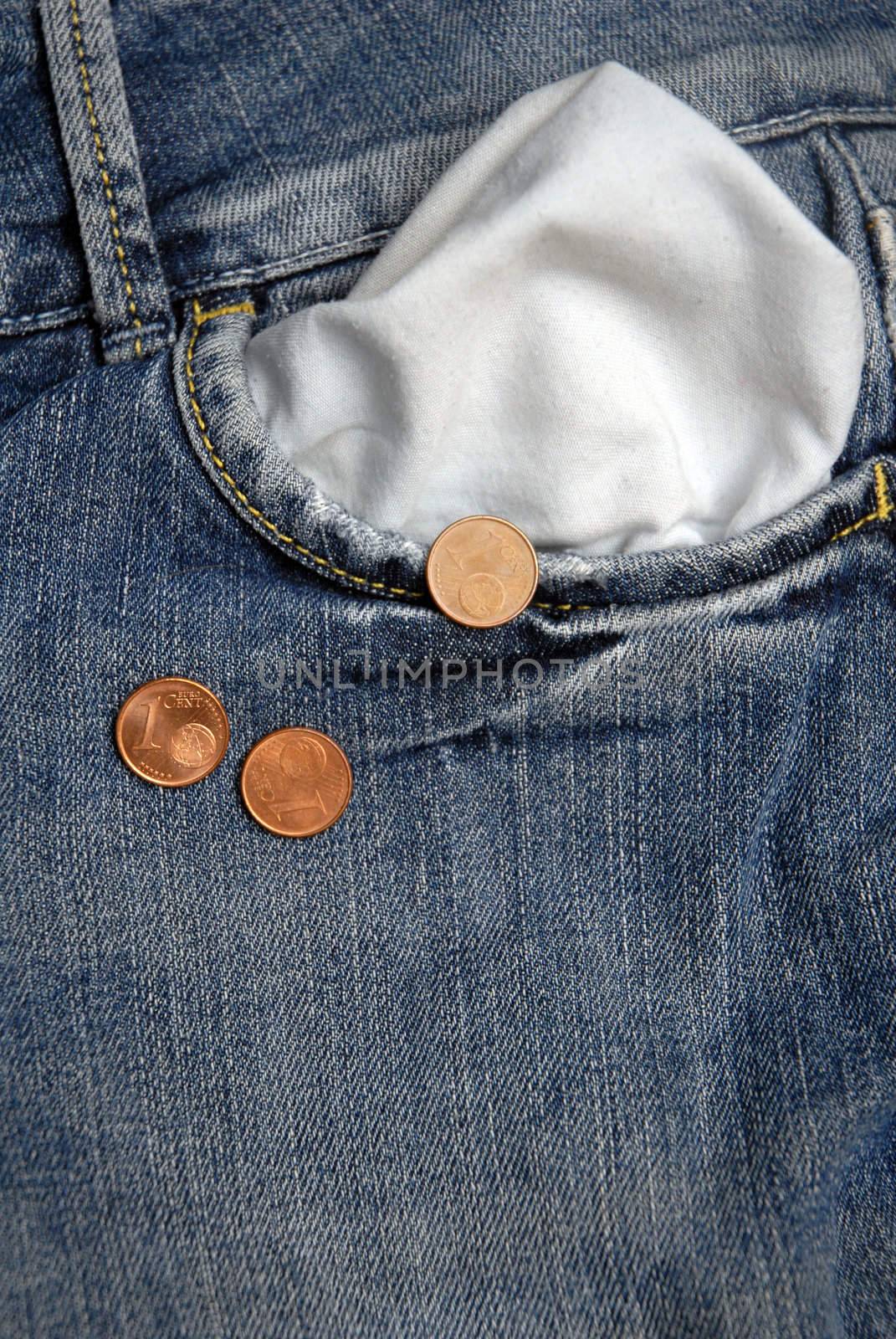 Three cents of euro falling from jeans