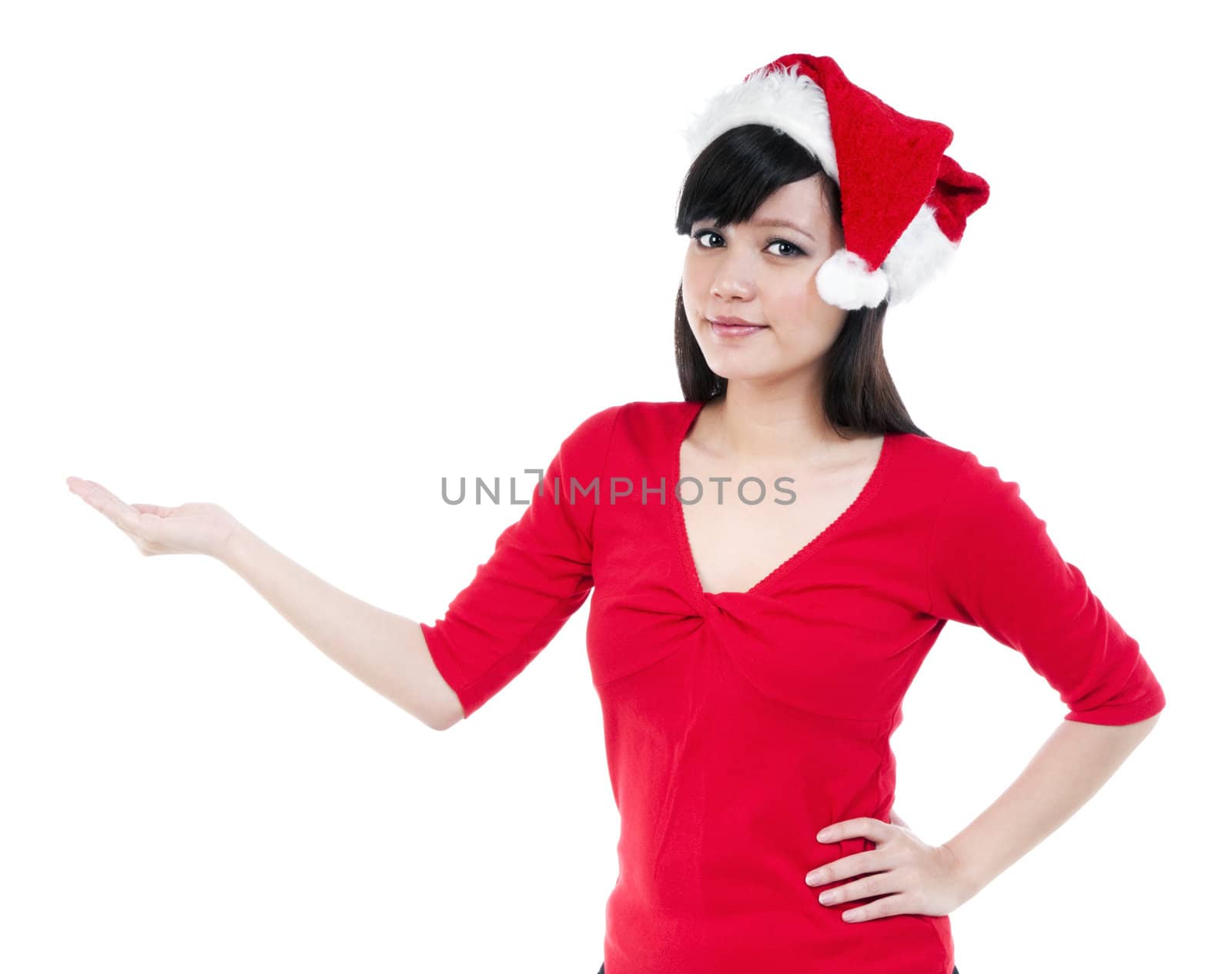 Portrait of a cute Christmas woman with her hand outstretched against white background