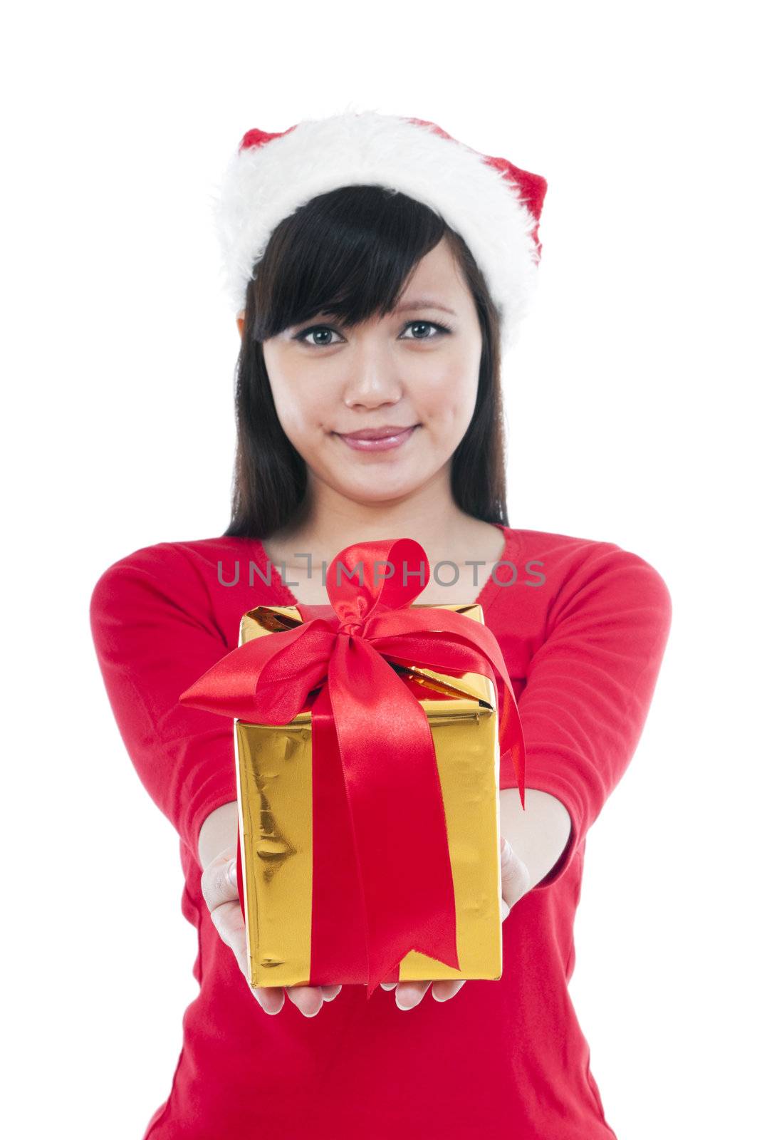 Portrait of a cute Christmas woman presenting gift, isolated on white background