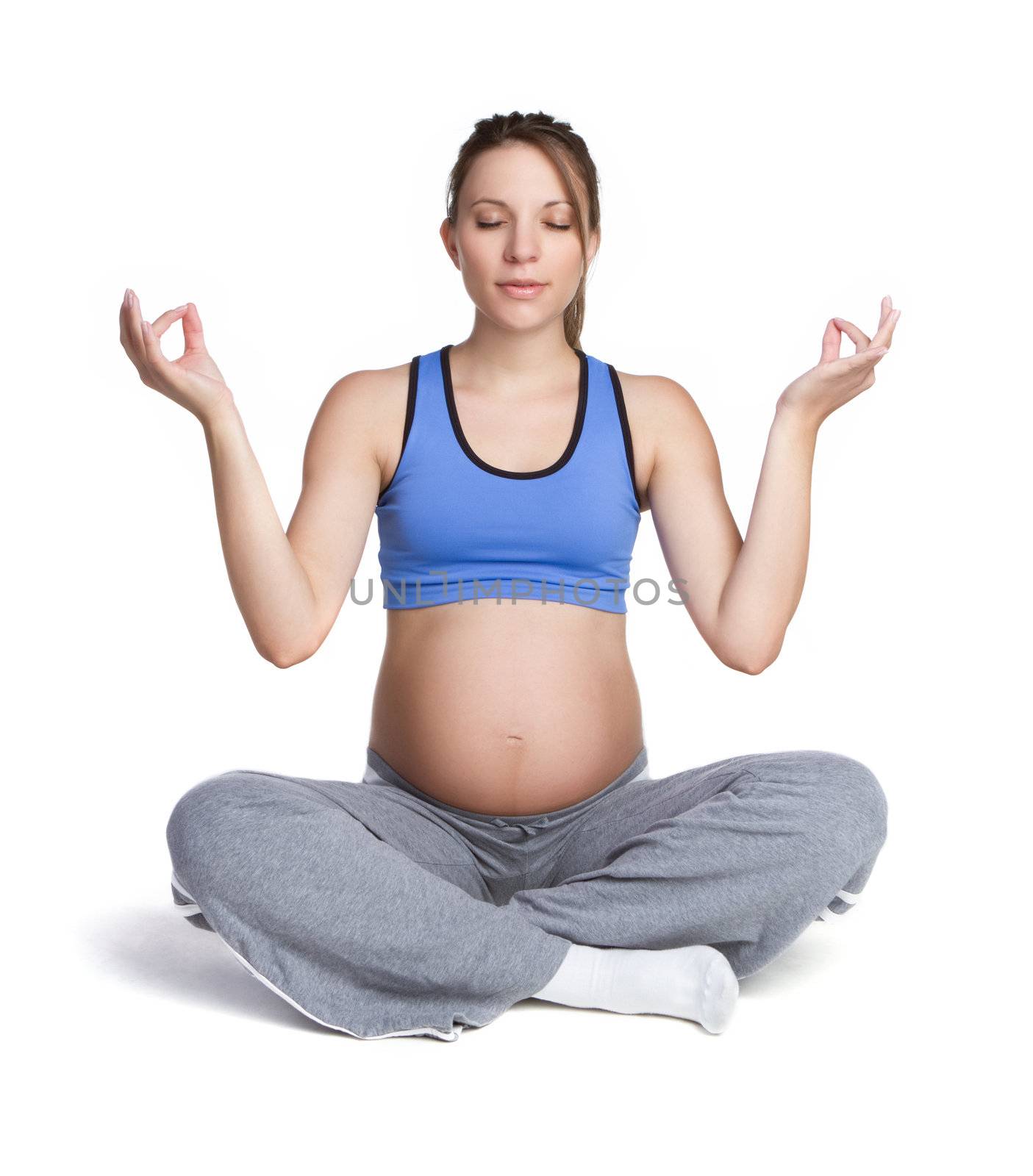 Pregnant woman doing yoga exercise