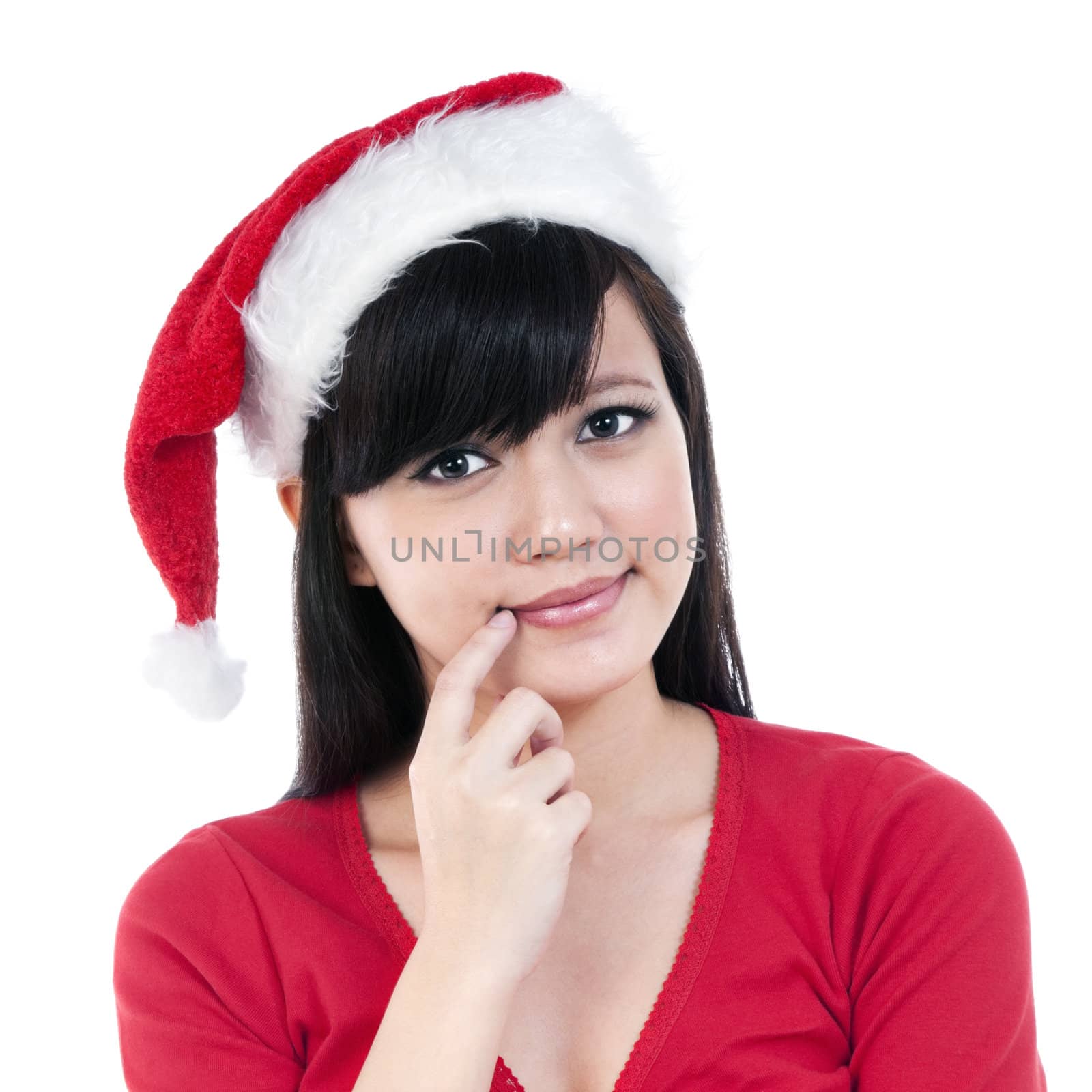 Portrait of a beautiful Christmas woman thinking isolated on white background.