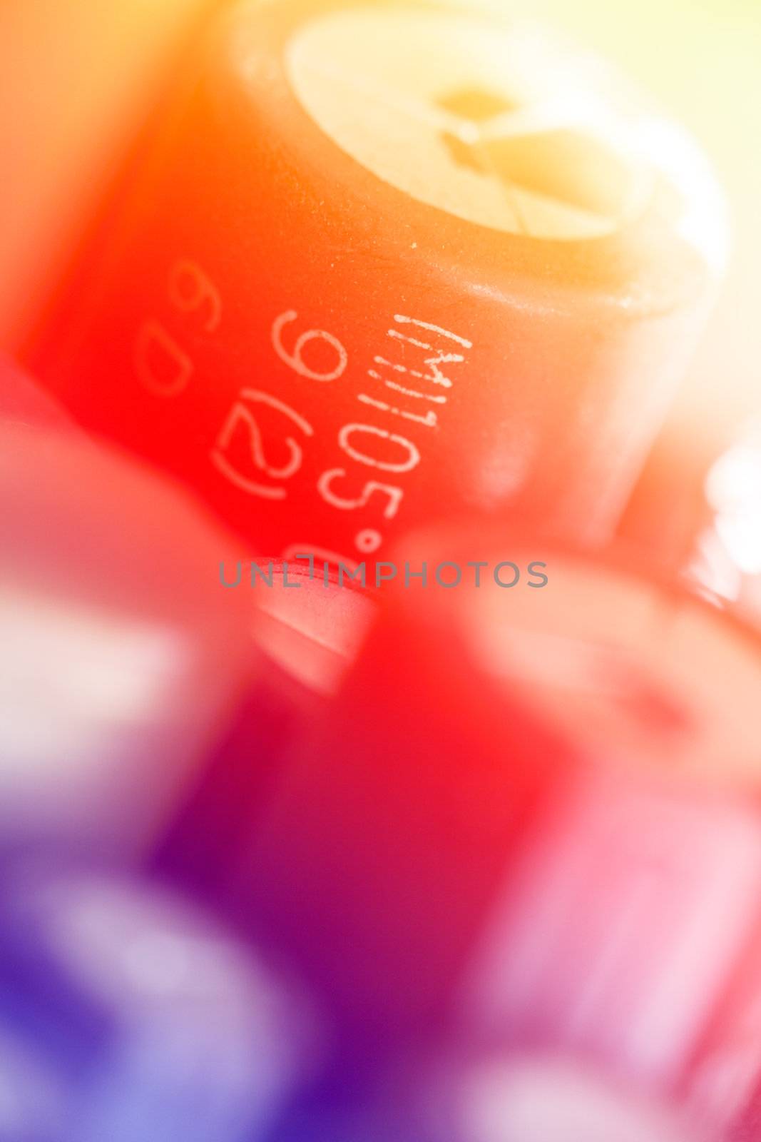 Colored electronic components (capasitors), shallow depth of field