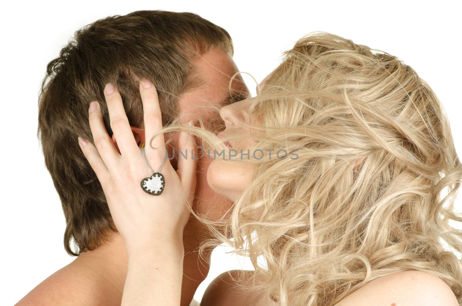 Kissing man and woman - lovers closeup portraits