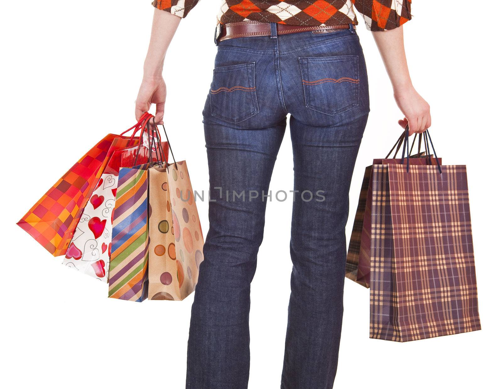 Happy woman holding shopping bags by adamr