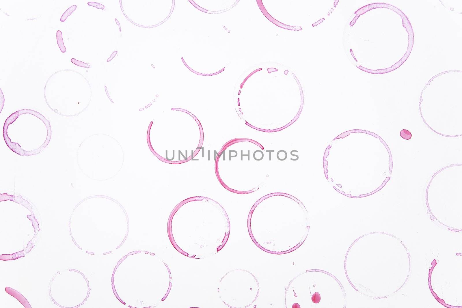 close up of wine glass marks on white background 