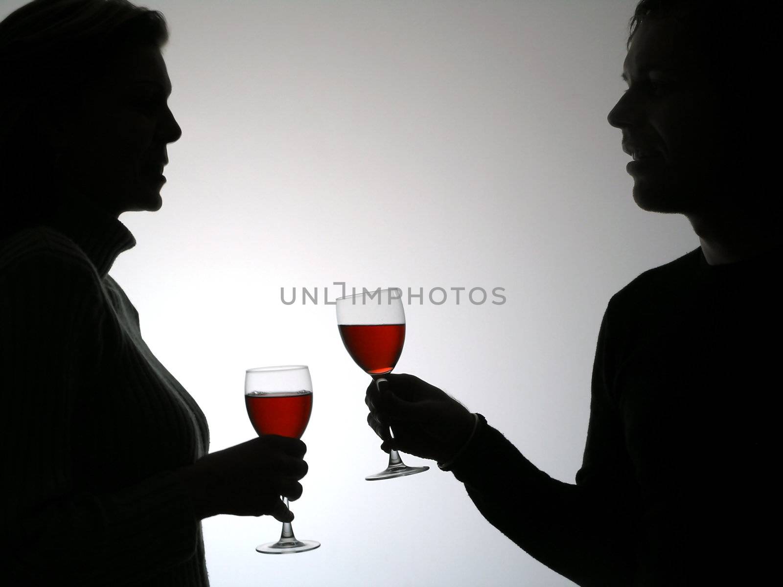 Couple drinking red vine