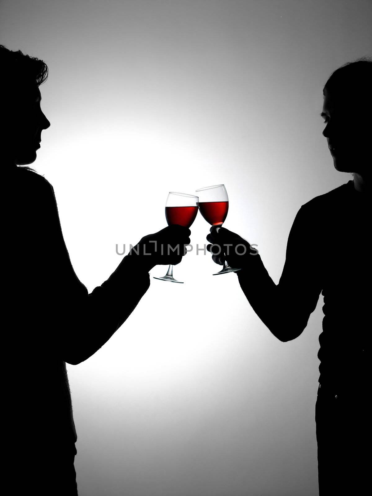 Couple drinking red vine