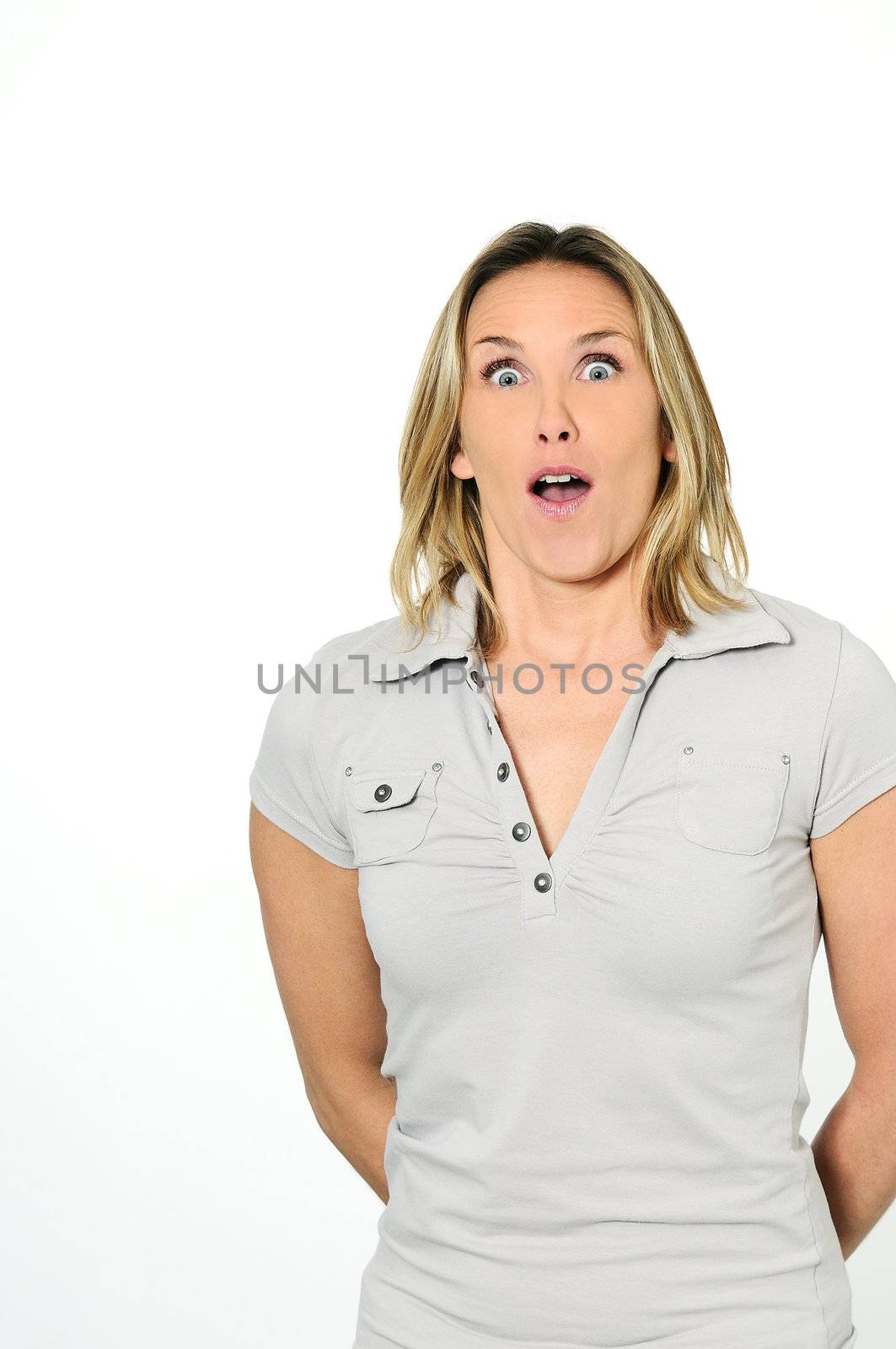 blond expressive and surprised woman on a white backgroung