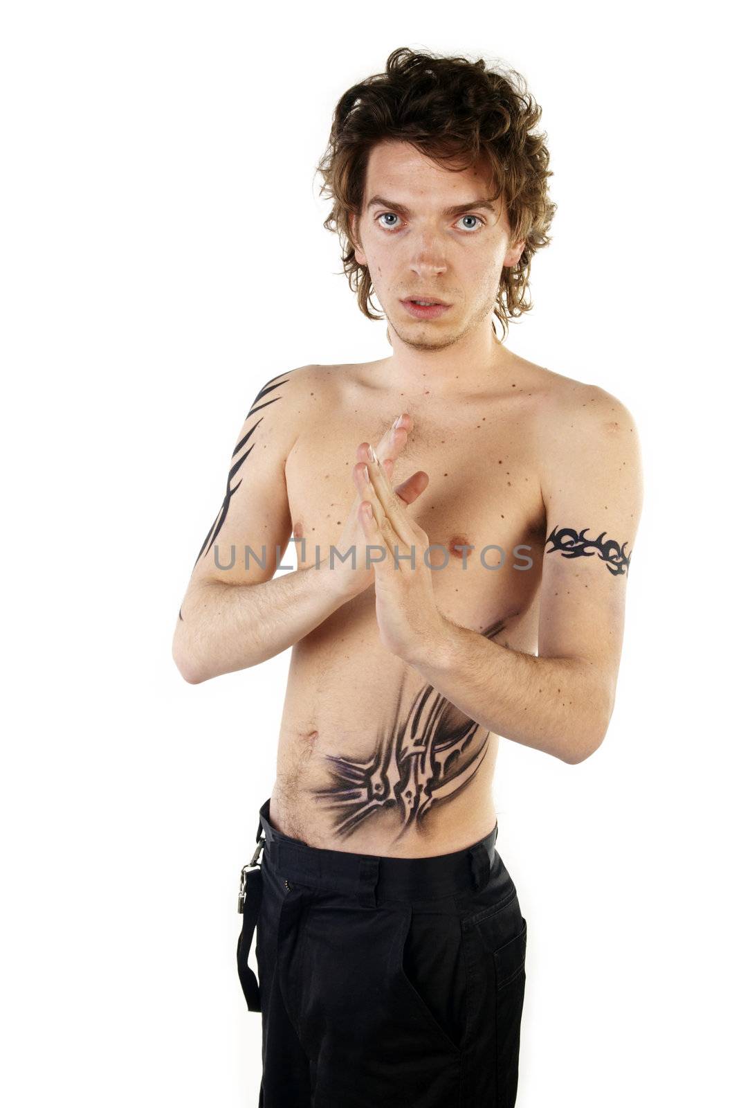 Man with tattoos posing