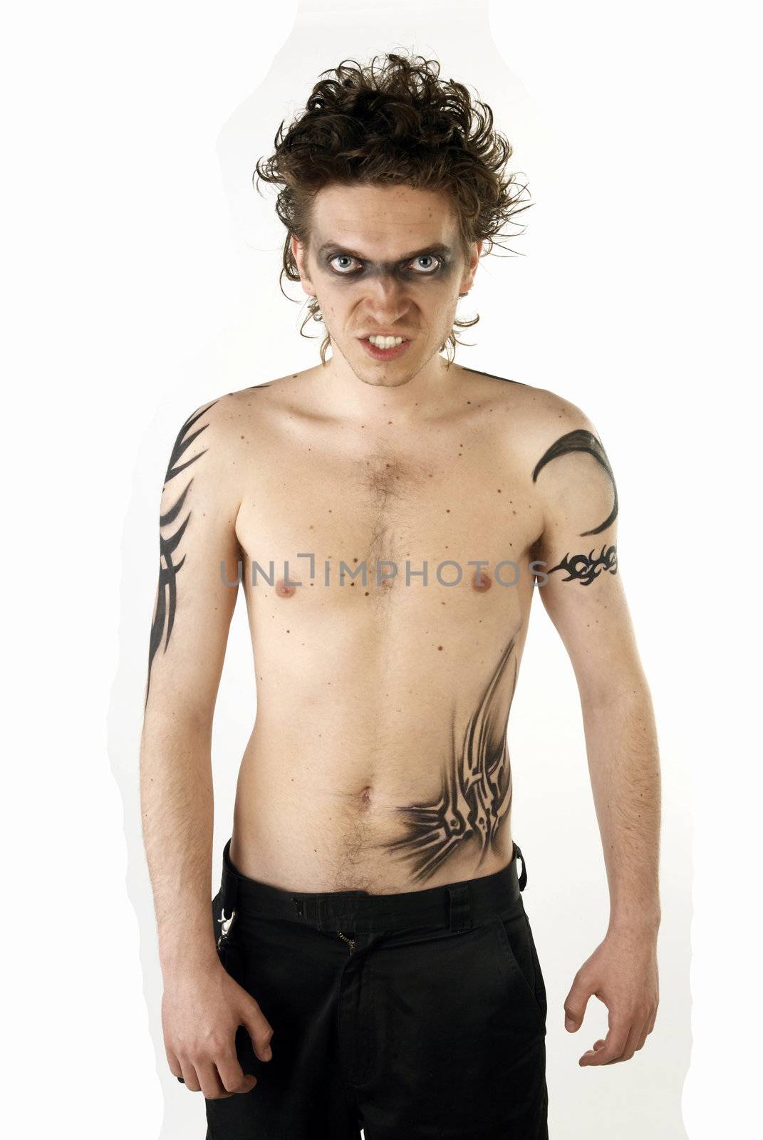 Man with tattoos posing