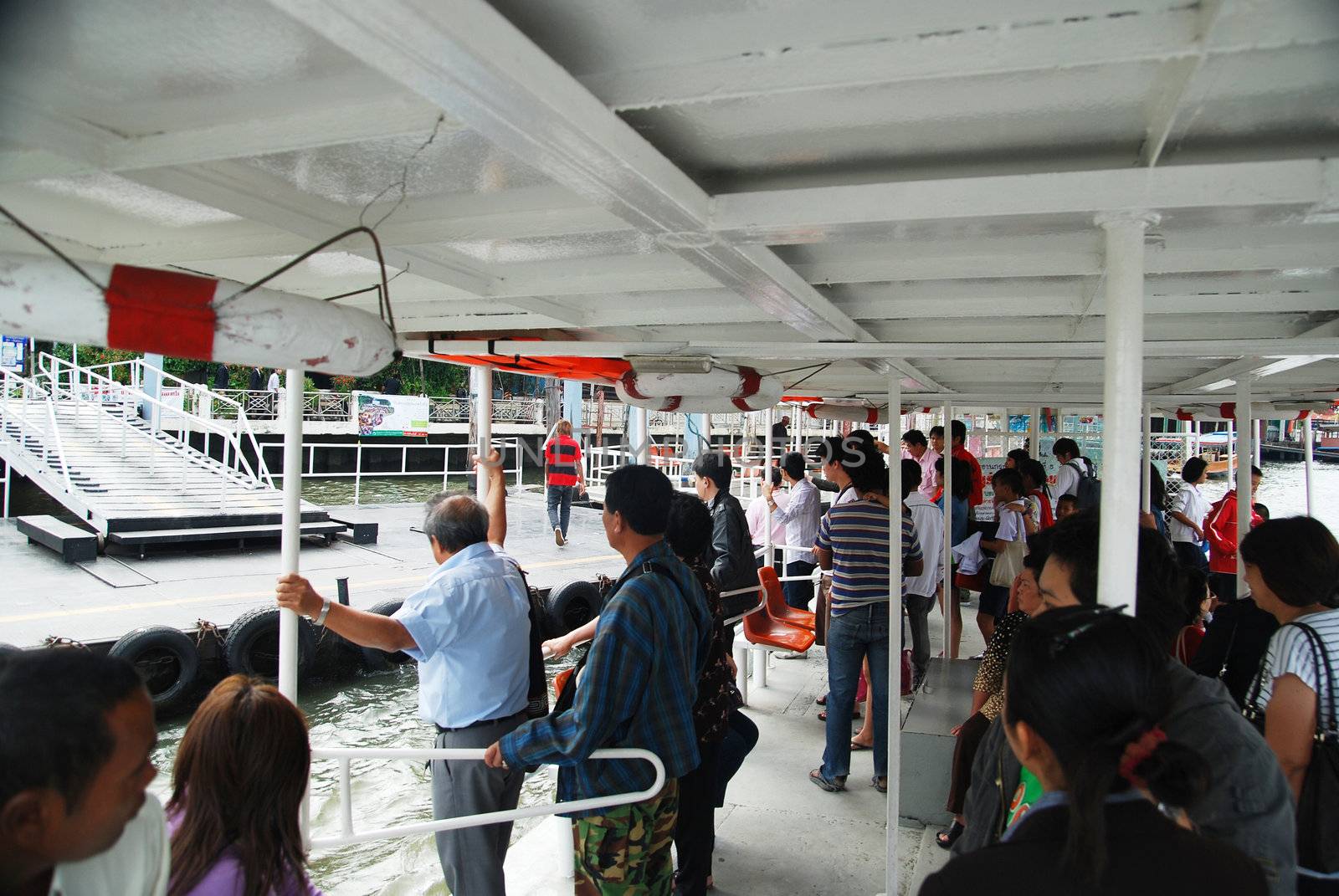 Passengers boarding on sea liner 
