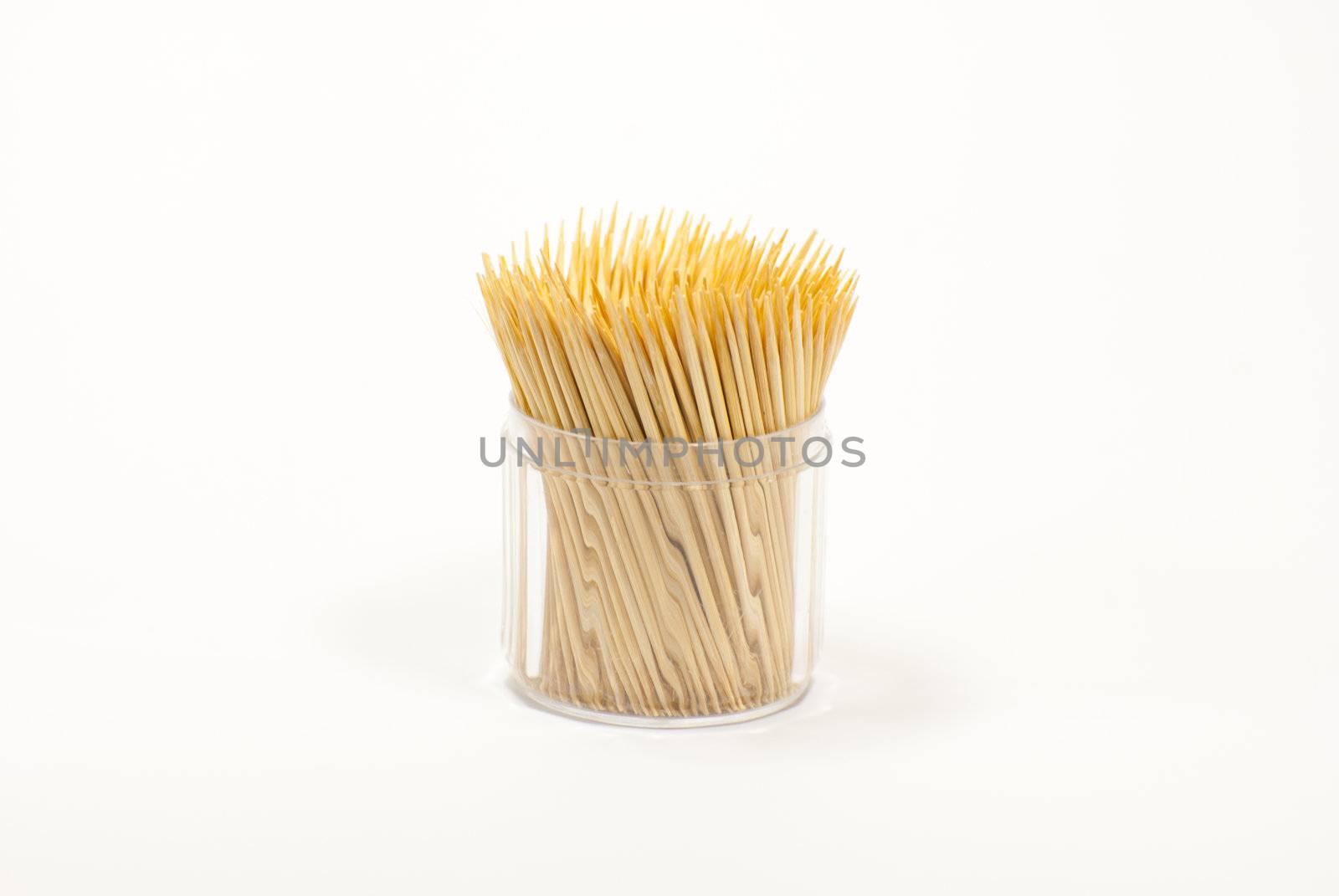 Wood toothpicks on a white background 
