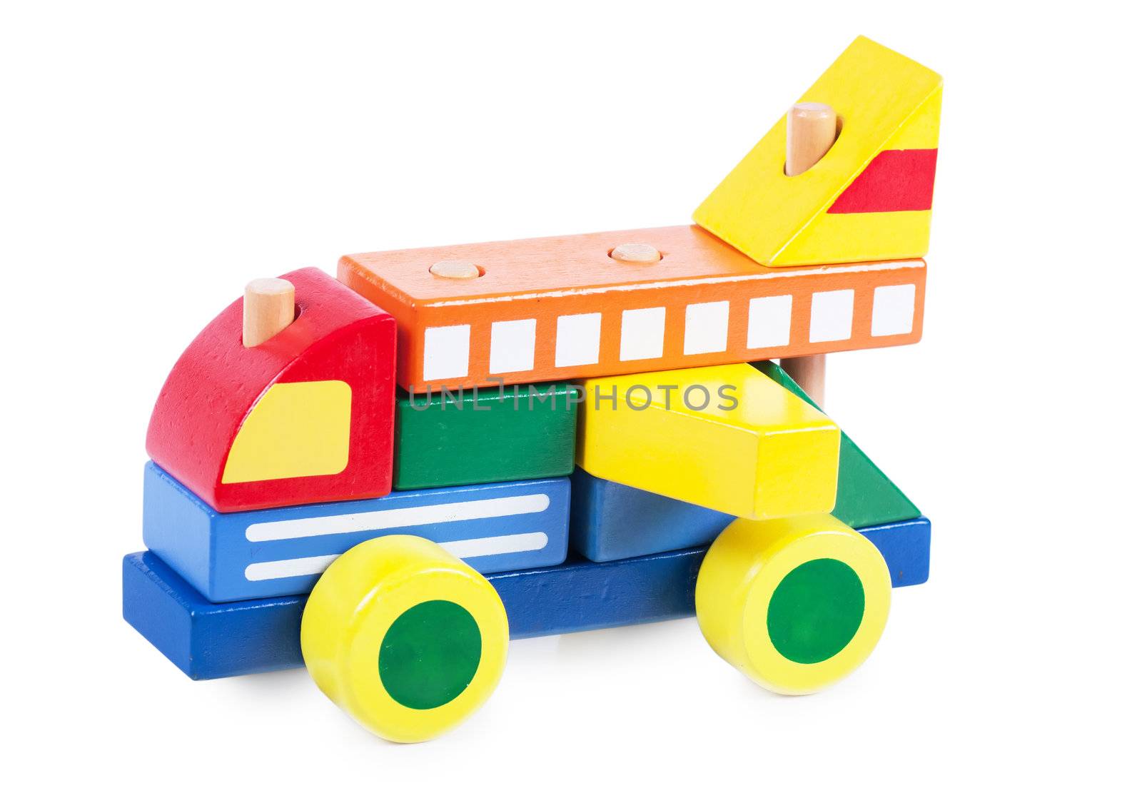 A car made of wooden colorful blocks buildings isolated over white