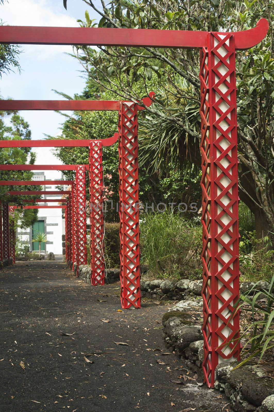 Red pergola oriental style in a park, Azores, Portugal