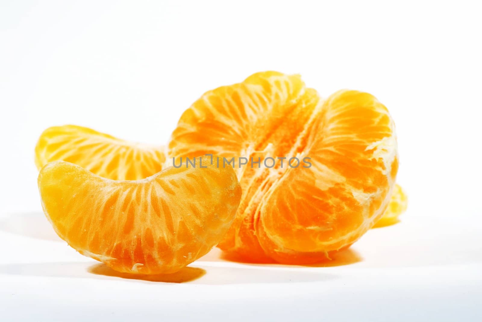 orange ripe mandarin on white background
