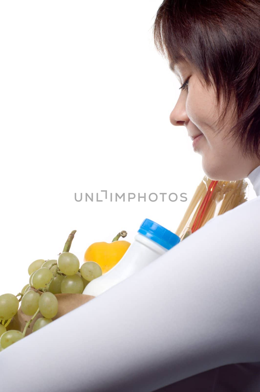 Pretty girl with package of  purchases, isolated