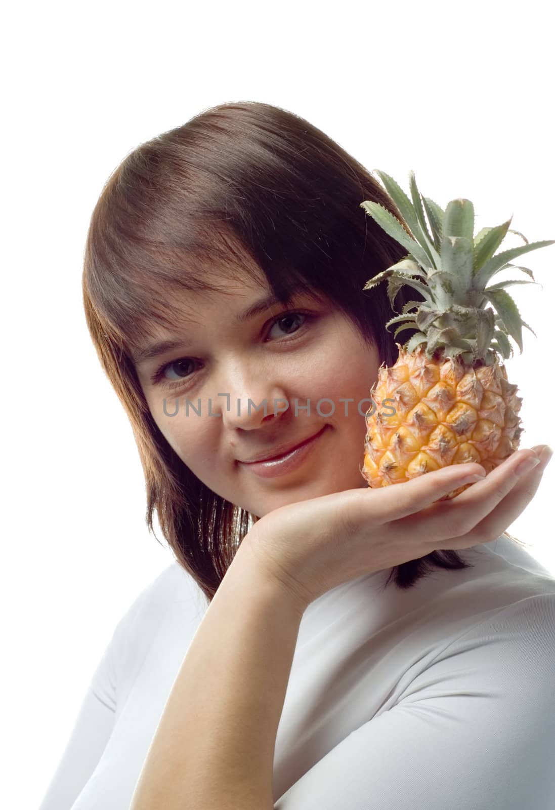 Beautiful girl with pineapple, white blouse, isolated